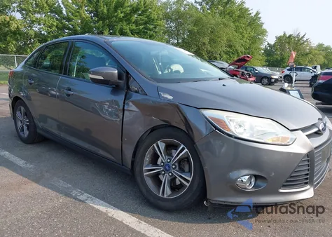 2014 Ford Focus Se z USA, uszkodzony, nr VIN 1FADP3F2XEL344695